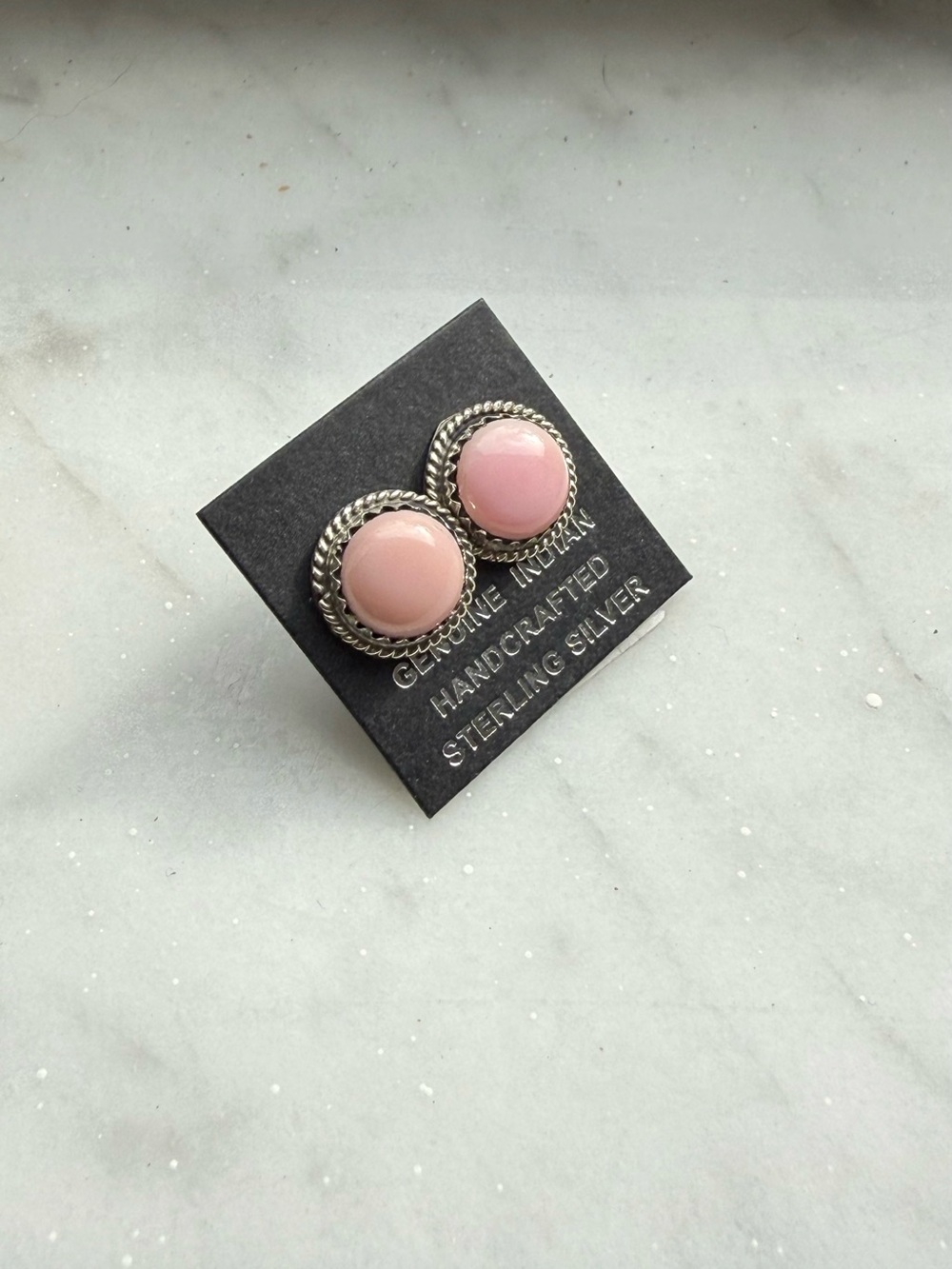 Genuine native made pink coral and sterling silver post earrings
